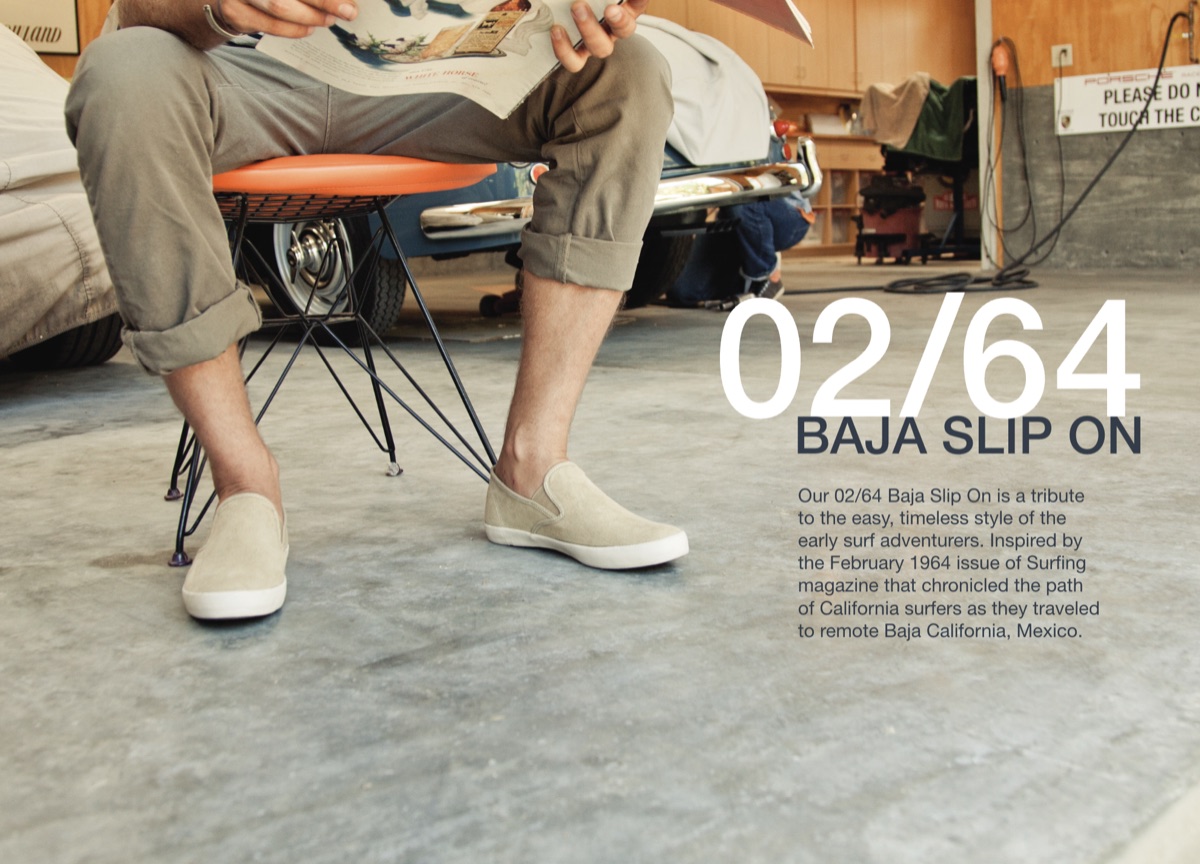 SeaVees 02/64 Baja Slip On campaign: man on an orange stool in a vintage car garage wearing tan suede slip-ons