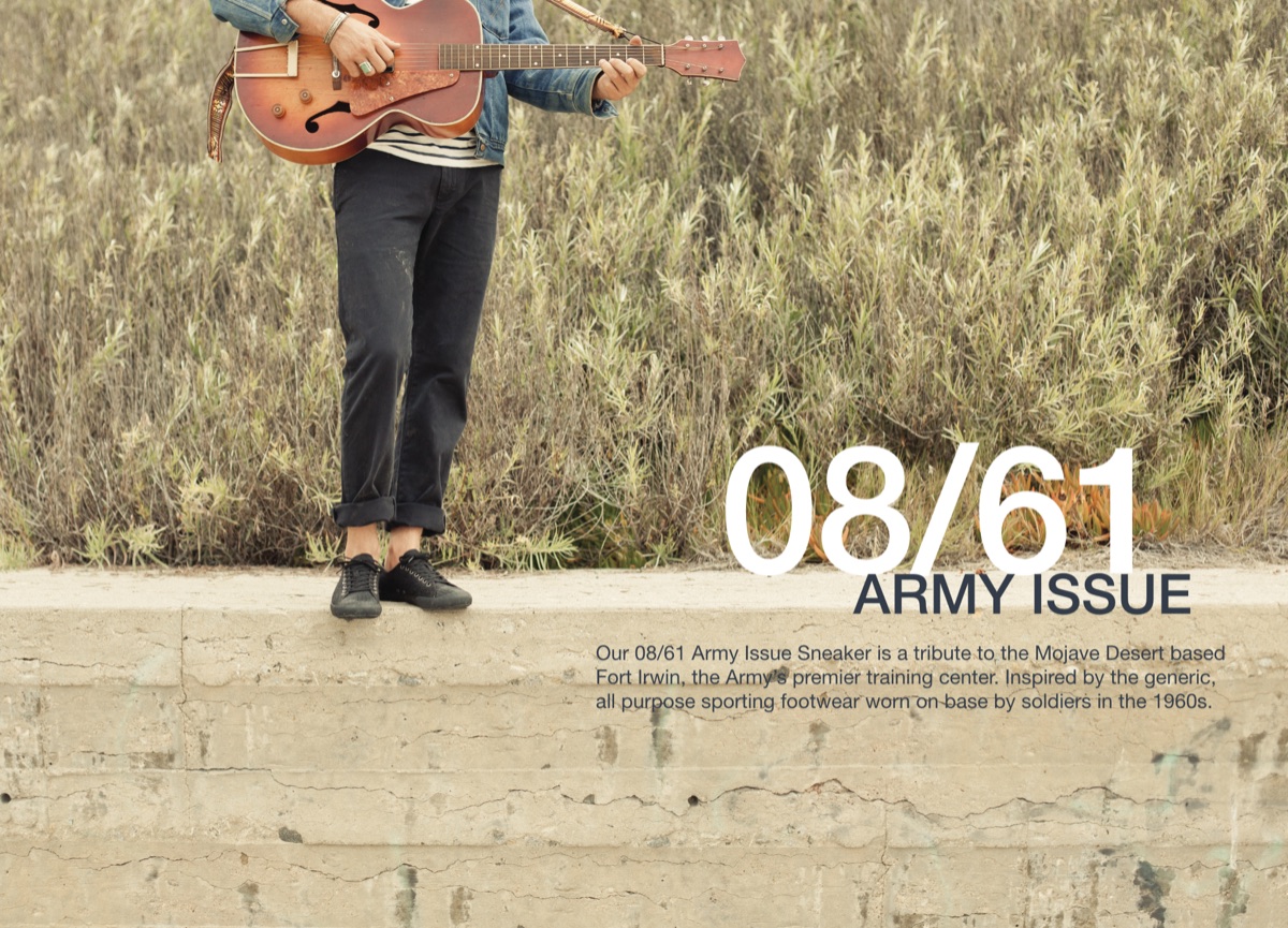 SeaVees 08/61 Army Issue campaign: guitarist standing on a concrete wall wearing black canvas sneakers