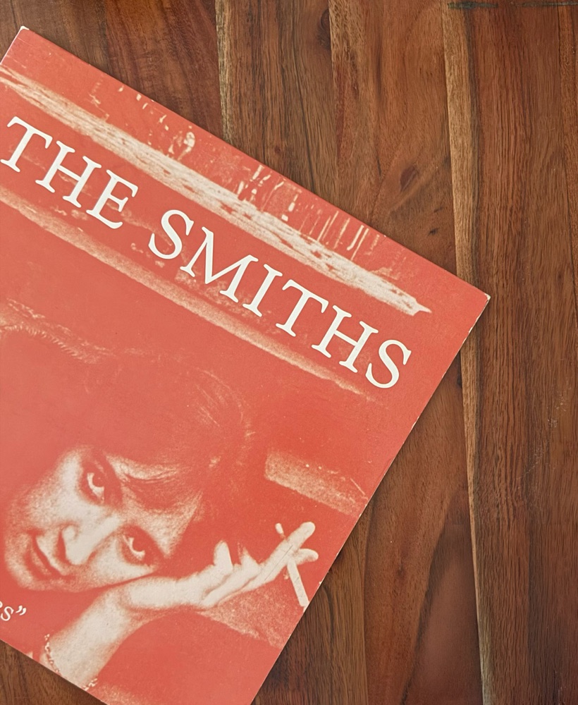 The Smiths record sleeve on a wood table